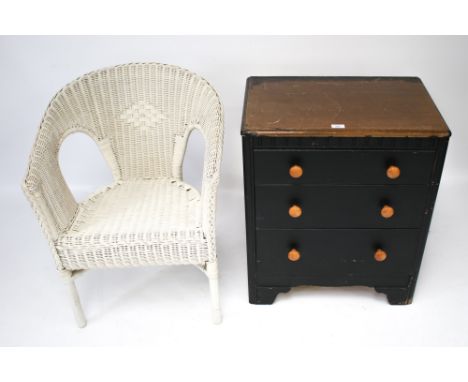 A vintage Lloyd Loom elbow chair and wooden chest of drawers. The chair painted white, H77cm, the chest of drawers with an oa