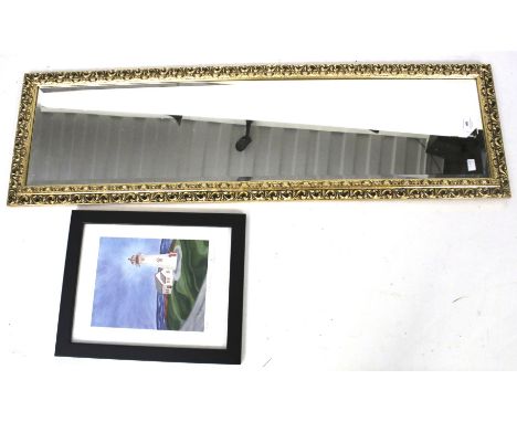 A full length bevel edged gilt wall mirror and a framed print. The signed limited edition print 'East Point Glow' 30/200 by P