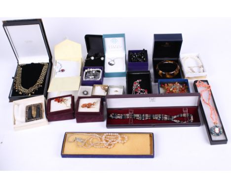 A collection of twenty boxes of assorted costume jewellery.  Including Celtic Lands enamel Celt necklace, earrings and bracel