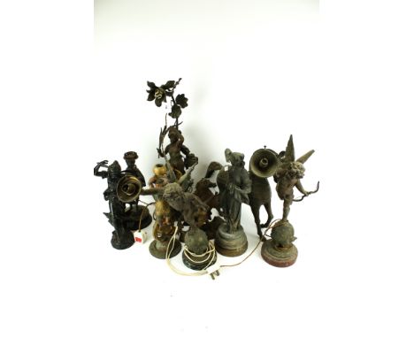 A collection of contemporary metal figures. Mostly spelter, including a cherub wall bracket, a lamp base modelled as a fairy,