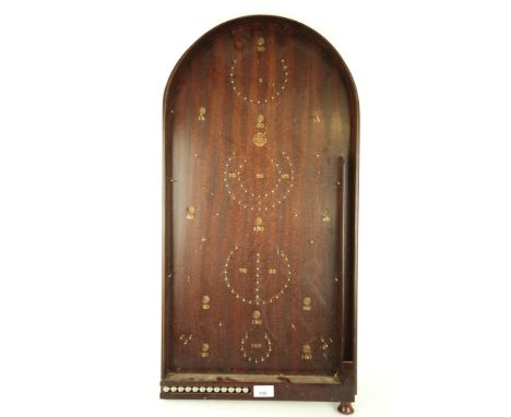 A Past Times bagatelle game. 38cm x 74cm