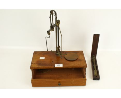 Two sets of vintage scales. Including a mahogany cased folding sovereign scales stamped Ladd &amp; Oertling and a later mahog