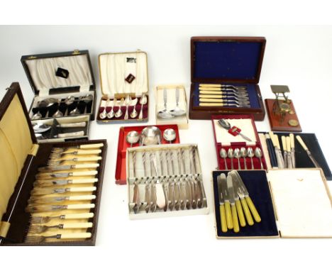 A collection of assorted vintage cased silverplated flatware. Including a set of letter scale, fish knives and forks, etc.