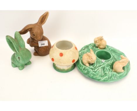 A collection of three assorted Sylvac pottery rabbits. Including #1303 and #1312 plus a Shelley Mabel Lucie Attwell mushroom.