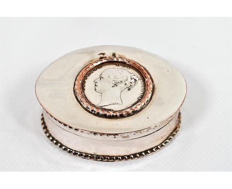 An early Victorian Old Sheffield Plate snuff box of oval form having gadrooned borders and lid inset with Victorian silver co