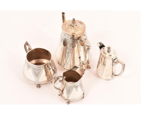 A late 19th Century aesthetic movement, three piece coffee set, standing on four paw feet with pineapple finial and engraved 