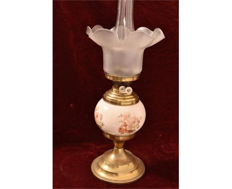 A Victorian style brass oil lamp with pottery body decorated with roses and with glass shade, Height 55cm x Width 21cm 
