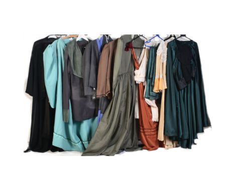 A collection of vintage late 20th century ladies two piece suits. The lot to include a dark grey matching jacket and skirt wi