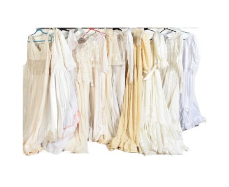 A collection of nine vintage mid to late 20th century wedding style women&rsquo;s dresses, used in performances and theatrica