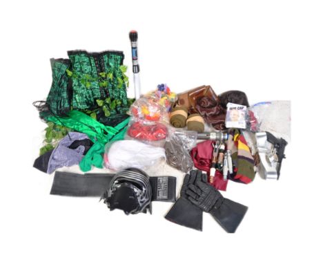 A collection of vintage 20th century pop culture props / masks / accessories , used in theatrical productions and stage perfo