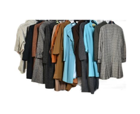 A large collection of vintage late 20th century ladies long coats / jackets. The lots to include a brick red coat, a tartan c