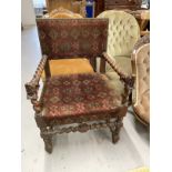 19th cent. Possibly Burmese oak carver chair, barley twist arms and column ending in lion hand