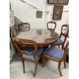 20th cent. Mahogany balloon back dining chairs with carved back supports on turned front legs, set