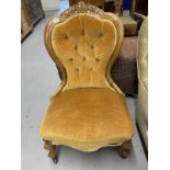 19th cent. Walnut button back nursing chair.
