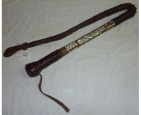 Persian style leather whip, the wooden shaft with inlaid bone, mother of pearl and wood in lay with unscrewing handle reveali