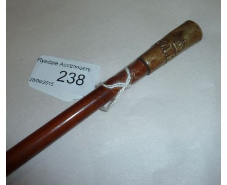 Officer's swagger stick, the plated top with crowned 69.T.R.B