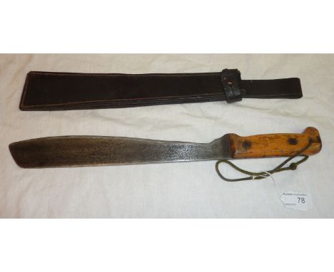 Unmarked military style machete with 13 inch blade, 2 piece wooden grip and leather sheath dated 1944