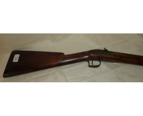 19thC percussion cap muzzle loading fowling piece with 35 inch brown barrel named H Nock London with drum and nipple cushion 