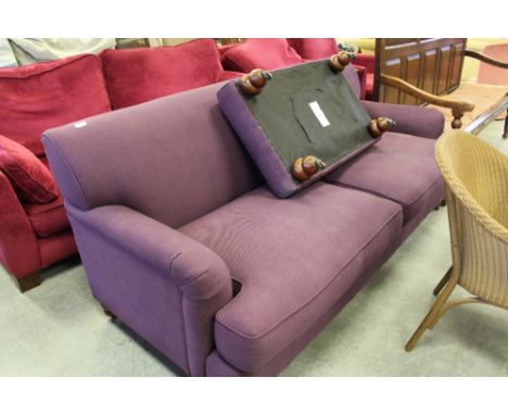 Purple sofa and footstool