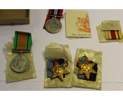 Group of four WWII medals to K. Cunliffe, 39-45 Star, 39-45 War Medal, Defence Medal and Africa Star