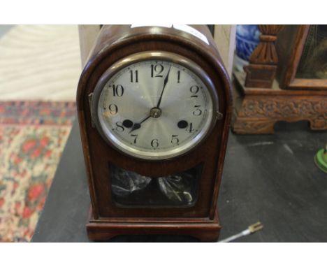 Arch top mahogany mantle clock