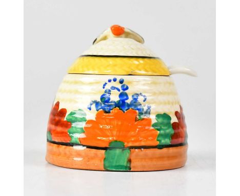 CLARICE CLIFF; a 'Bizarre' honey pot in the 'Gay Day' pattern, with printed marks to base, height 8cm.Condition Report: Sever