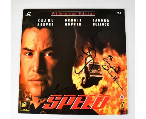 SPEED; a laser disc, widescreen edition, signed to the front cover by Dennis Hopper, Keane Reeves and Sandra Bullock.Conditio