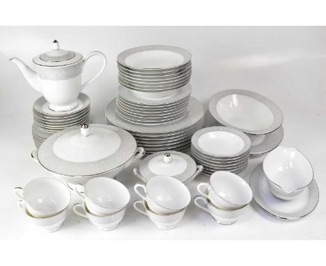 SANGO; a collection of tea and dinner ware with silver gilt-heightened decoration, to include cups, saucers, meat plates, tea