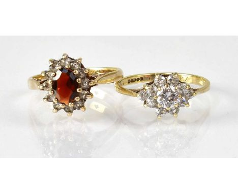 Two 9ct yellow gold floral cluster rings, sizes K and L, combined approx. 4.05g (2).