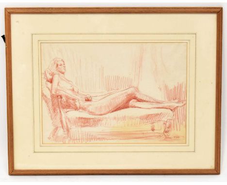 † AUGUSTUS JOHN (1878-1961); crayon on paper, portrait of a reclining nude female on a chaise longue, signed and dated 1924 l