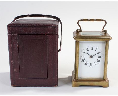 French carriage clock, the gilt brass case with bevelled glass, white enamel dial with Roman hours, lever platform escapement