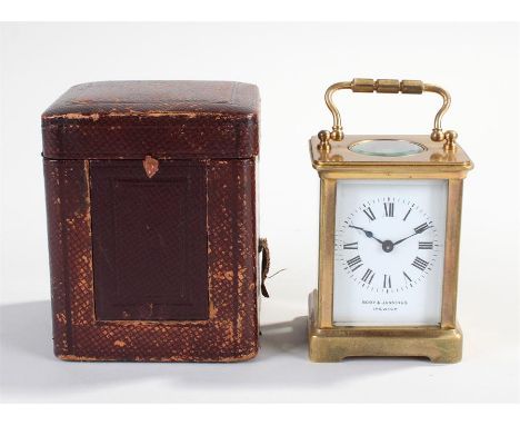 French gilt brass carriage clock, of small proportions, retailed by Boby & Jannings Ipswich, the bevelled glass case with whi