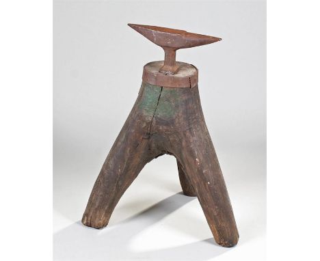 19th Century tripod based anvil, the socketed anvil above a three branch base, 87cm high