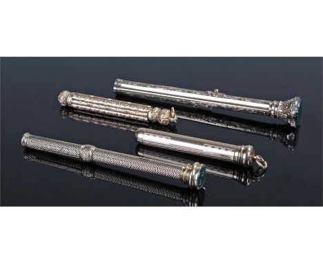 Four gold plated propelling pencils, to include a Victorian foliate engraved example, another with swag and flowers and two e
