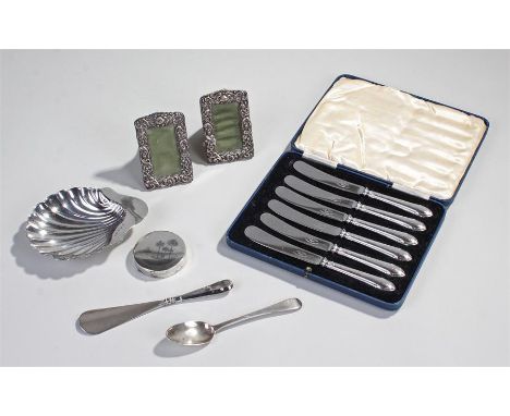 Collection of silver objects, various dates and makers, to include a butter dish, two small frames, a silver compact, a show 