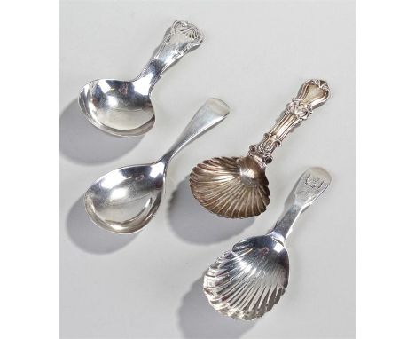 Four silver caddy spoons, to include a Victorian Irish silver shell bowl caddy spoon, Dublin 1848 makers mark rubbed, the sec