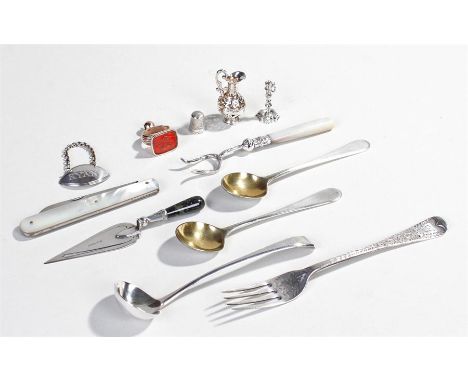 Collection of silver, to include a novelty bookmark in the form of a trowel, a seal, a ewer charm, mother of pearl fruit knif