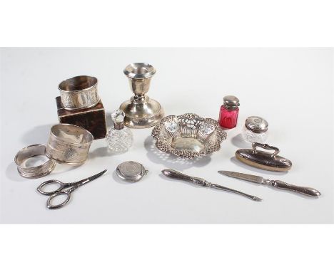 Collection of silver, to include silver capped bottles, napkin ring, a dish, candlestick, vanity set, etc, (qty)