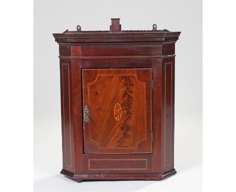 19th Century mahogany and satinwood inlaid corner cabinet, of small proportions, the stepped top above a single door with inl