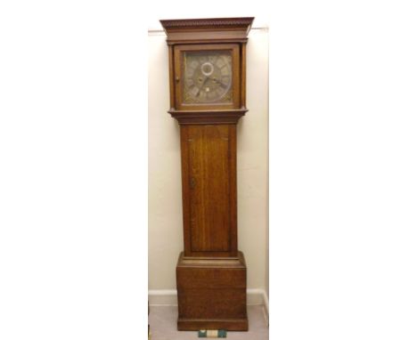 A late 18thC country made, light oak longcase clock, having a straight cornice, over a square, glazed panelled window, betwee