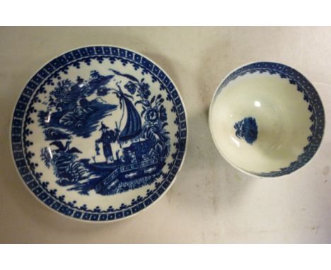 A late 18thC Caughley porcelain tea bowl and saucer, decorated in blue and white in Chinese taste with the Fisherman and Corm