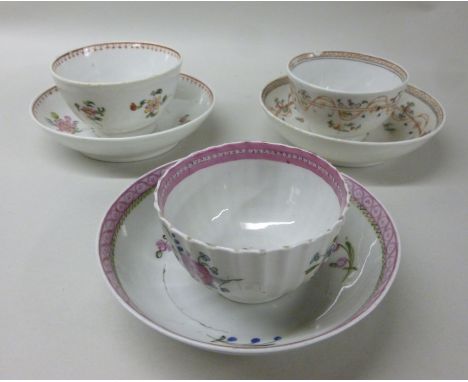 Three similar late 18thC New Hall porcelain tea bowls and saucers, decorated in colours with simple floral designs  pattern n
