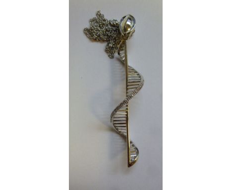 An 18ct white gold, diamond set, spiral ladder pendant, on a fine neckchain