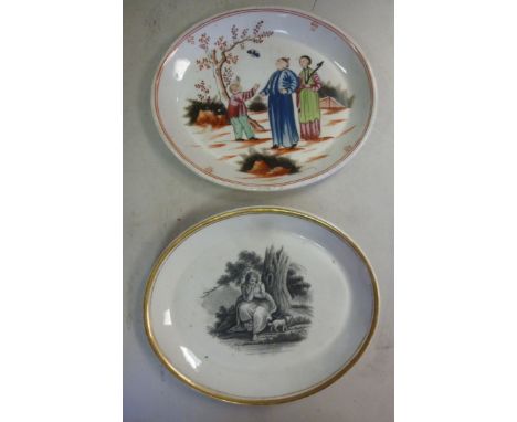 Two similar late 18thC New Hall porcelain oval dishes, one decorated in monochrome a woman and a dog, seated beside a tree wi