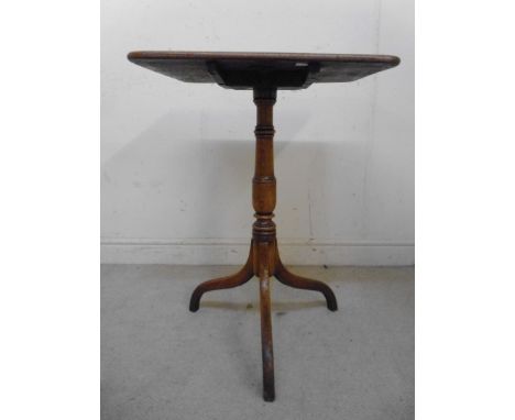 An early/mid 19thC country made, light oak pedestal table, having a rectangular tip-top, over a tapered, ring turned column, 