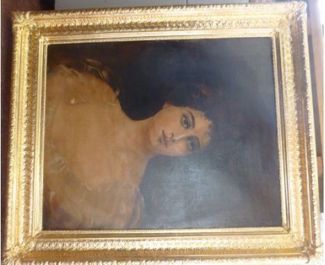 Early 20thC British School - a head and shoulders portrait study, a young woman wearing a lace trimmed dress  oil on canvas  