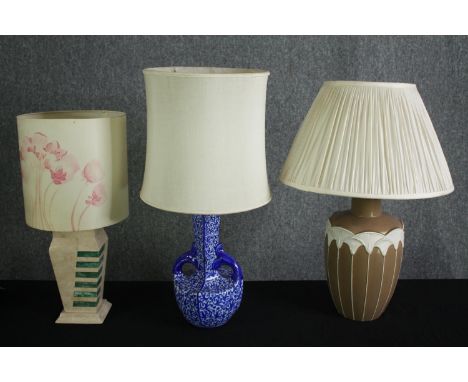 A miscellaneous collection of ceramic table lamps with their shades. H.60cm. (each). 