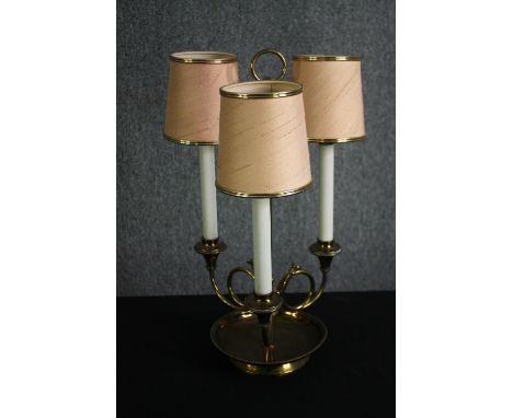 A three branch brass lamp. H.51cm. 