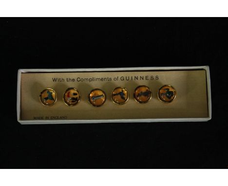 A boxed set of vintage Guinness buttons. L.16 W4.5cm. (box). 