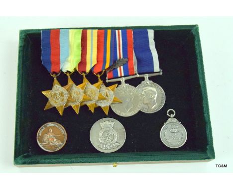 An impressive Royal Navy WW2 mounted medal group including the 39/45 Star, Atlantic star, Africa Star, Burma Star, war Medal 